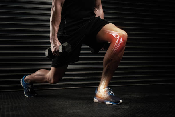 Studio shot of an unrecognizable man working out with dumbbells