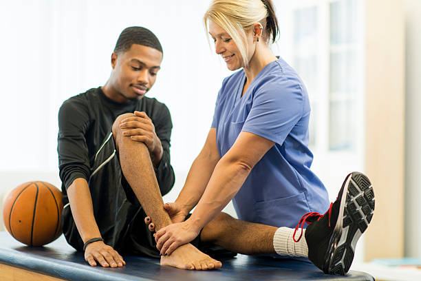 Athlete being treated for sports injuries.